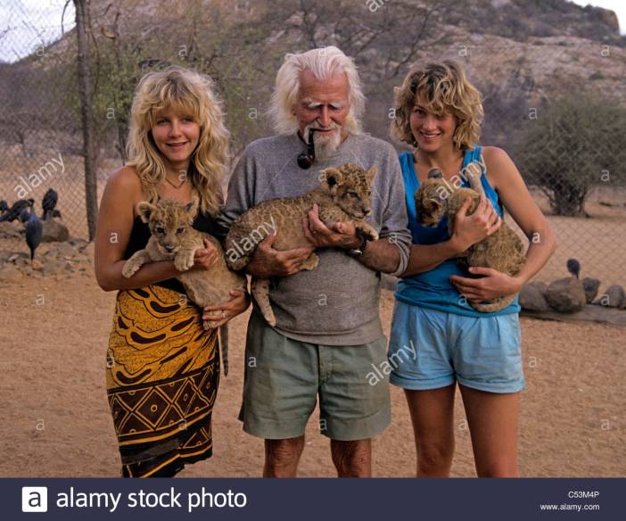 george-adamson-with-doddi-carla-holding-young-lion-cubs-at-kora-rock-C53M4P